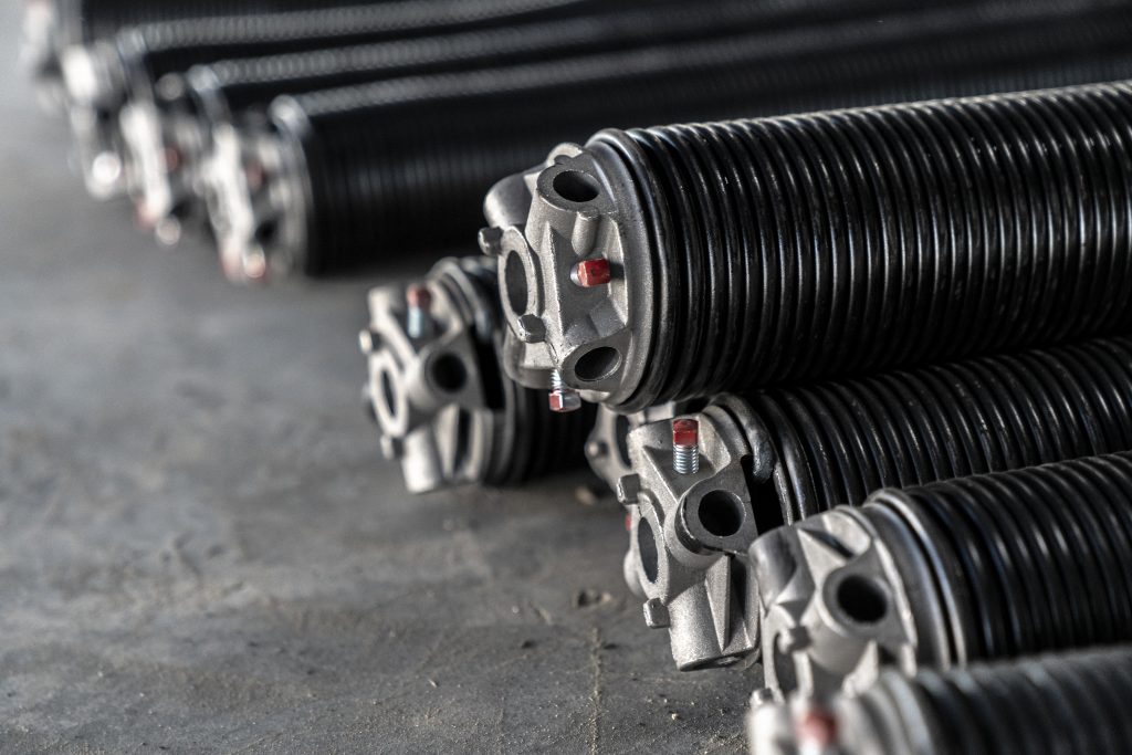 When should you replace your garage door springs Titan Garage Doors LLC